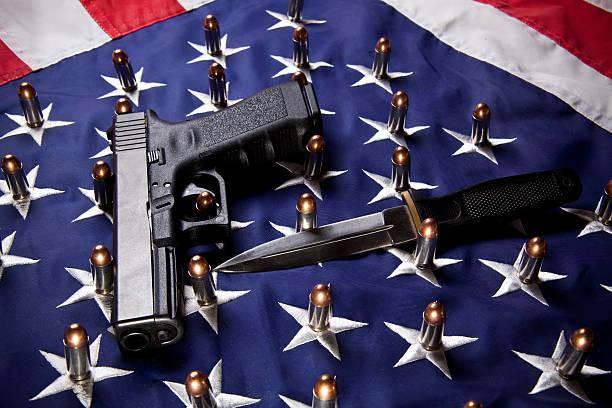istock Pistol, knife, bullets and flag (horizontal) 174659982