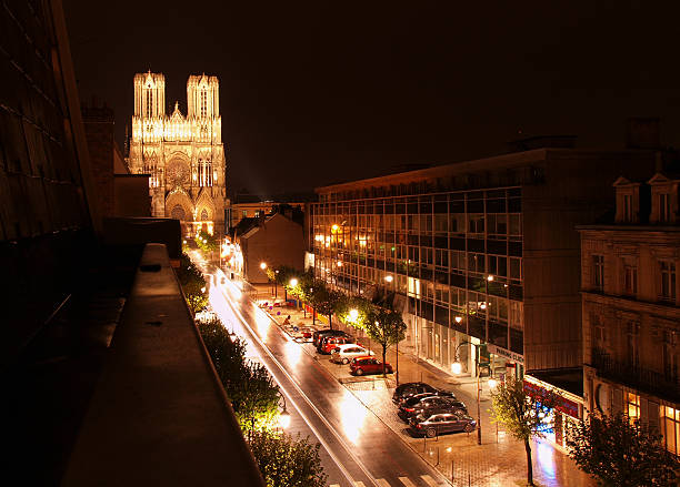 A night photograph of the 14th century west front of the Cathedral of Reimes