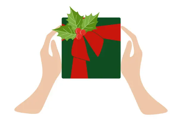 Vector illustration of Top view Vector of Two female hands holding Gift box with red ribbon and holly berry. Christmas and New Year present template. Flat cartoon Holiday illustration for Postcard, Banner, Advertisement