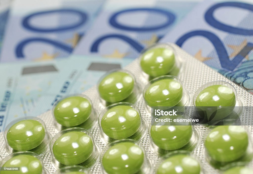 Medicine and money Euro banknotes with pills Arranging Stock Photo