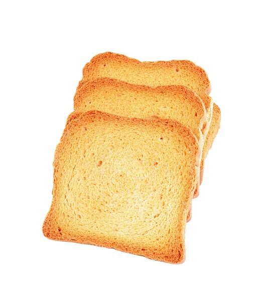 Stack of rusks - isolated on white "Zwieback on white backgroundzwieback stacks, white background" zwieback toast stock pictures, royalty-free photos & images