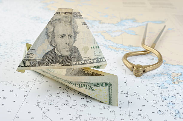 segeln unbegrenzten wasser, amerikanische währung. - nautical chart drawing compass map old stock-fotos und bilder