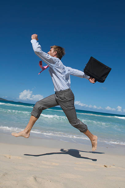 istock Businessman Runs w Briefcase on Beach 174662839