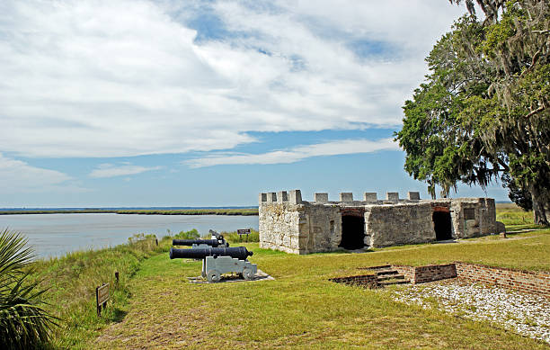 Fort Frederica National Monument on St. Simon's Island "Fort Frederica National Monument on St. Simons Island, Georgia, preserves the archaeological remnants of a fort and town built by James Oglethorpe between 1736 and 1748 to protect the southern boundary of the British colony of Georgia from Spanish raids. About 630 British troups were stationed at the fort. A town of up to about 500 residents existed outside the fort." saint simons island photos stock pictures, royalty-free photos & images