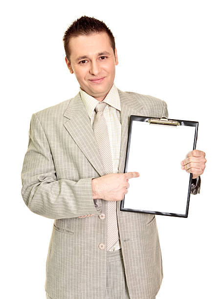 istock Successful businessman with paper clip board isolated on white 174663246