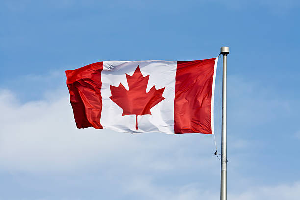 istock Canadian flag flapping in the wind 174663574