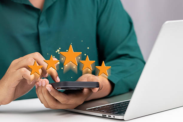 istock Customer or User give rating to service experiences review satisfaction feedback survey on online application, Customer can evaluate quality of service leading to reputation ranking of business. 1746639159
