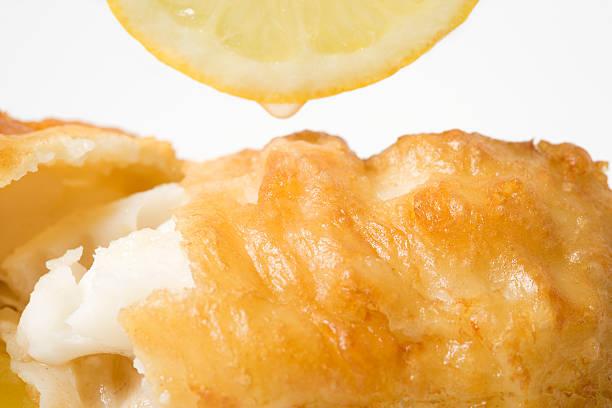 tasty fried fish with a drop of lemon 