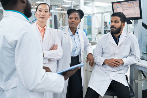 istock Team of scientists discussing at laboratory 1746648680