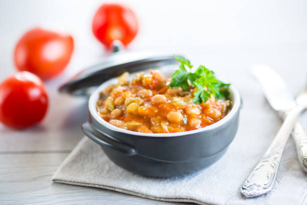 istock Cooked white beans with zucchini and other vegetables. 1746651701