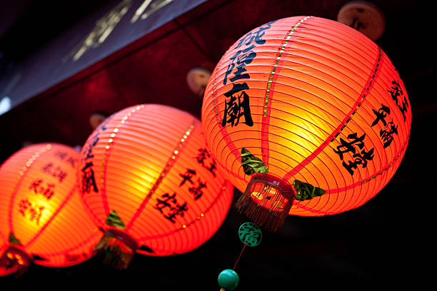 istock Red paper lanterns hanging in a Buddhist temple 174665184