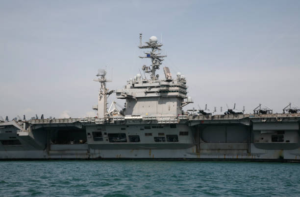 istock Aircraft Carrier at Sea 174665220