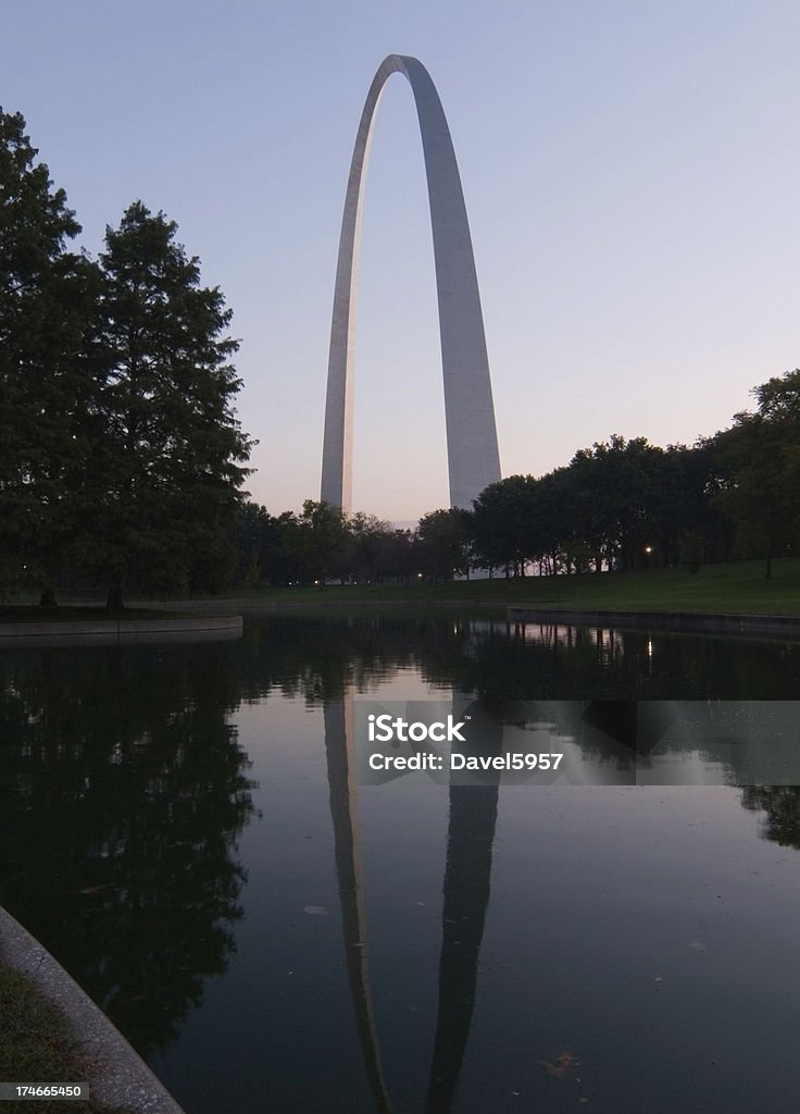 Gateway Arch at Dawn Gateway Arch at dawn from a lake in the Jefferson National Expansion Memorial.More St. Louis images: Arch - Architectural Feature Stock Photo