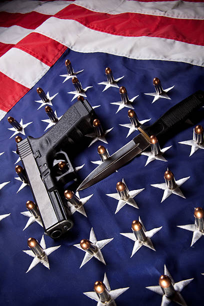 istock Pistol, knife, bullets and flag (vertical) 174665683