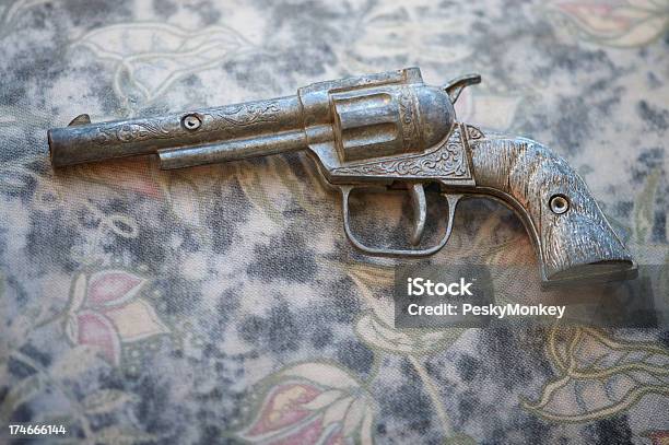 Toy Pistol Gun On Antique Background Stock Photo - Download Image Now - Antique, Collection, Copy Space