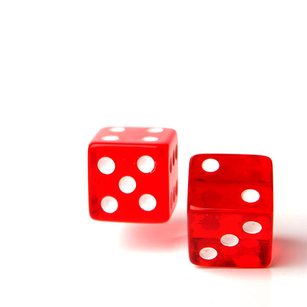 istock Pair of rolling red dice on white background. 174666334