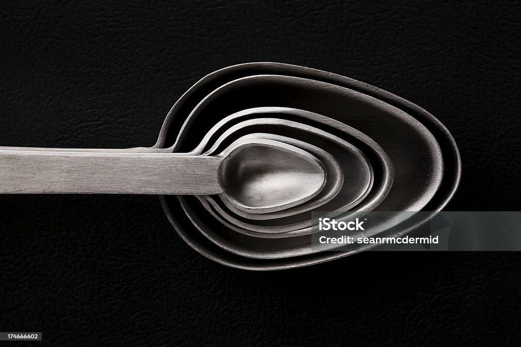 Misurazione Spoons nidificati - Foto stock royalty-free di Argentato