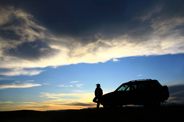 istock Relaxed Cowboy Beside His SUV 174666704