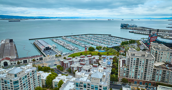 The waterfront of downtown San Diego, California, highlighted by the Marina, Convention Center, and hotels along the shore of the harbor.  I shot this image from an elevation of about 400 feet during a photo flight in a chartered helicopter.  