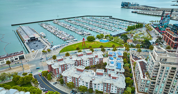 Image of Aerial over buildings looking at Pier 40 with South Beach Harbor in the bay