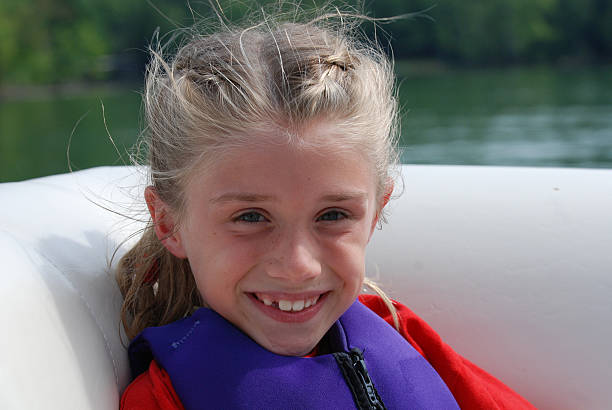 istock Little Girl Riding on Boat 174667027