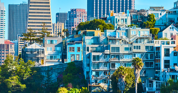Image of Aerial sunny San Francisco apartment buildings with downtown skyscrapers