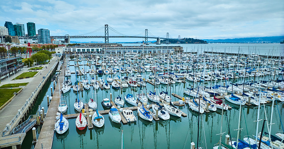 Image of Aerial South Beach Harbor and Pier 40 with Oakland Bay Bridge on skyline