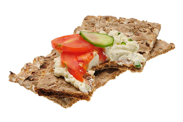 Bitten low caloric open sandwich. Isolated on the white
