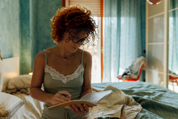 istock A woman has just woken up who writes in her diary 1746683039