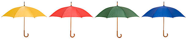 istock Four umbrellas in yellow, red, green and blue 174668523