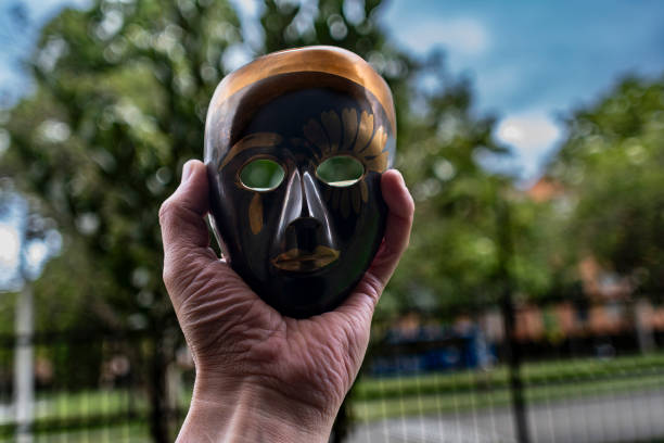 istock African bronze mask on a human hand 1746691617