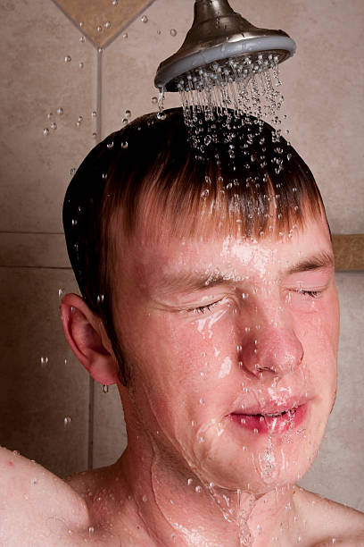 istock Teenage boy taking a shower 174669522