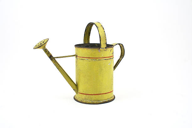 Vintage, tin toy watering can. 7 inches high.