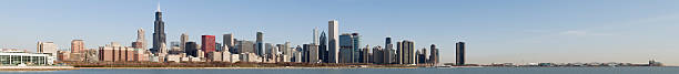 Large Panoramic View of Chicago Skyline (XXXL) A large panoramic view of the Chicago skyline shortly after sunrise. aon center chicago photos stock pictures, royalty-free photos & images