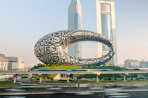 Dubai, United Arab Emirates - June 21, 2023: Timelapse of Museum of the Future and Sheikh Zayed road in Dubai