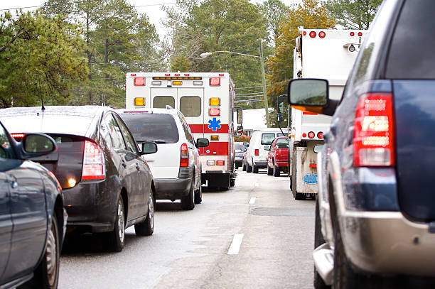 winter traffic, ambulance stuck in traffic
