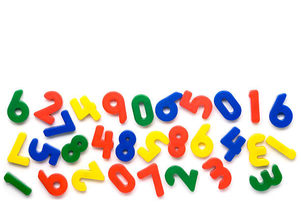 Colorful magnetic numbers on white background Toy magnetic numbers background. More related images in Zocha`s objects number magnet stock pictures, royalty-free photos & images