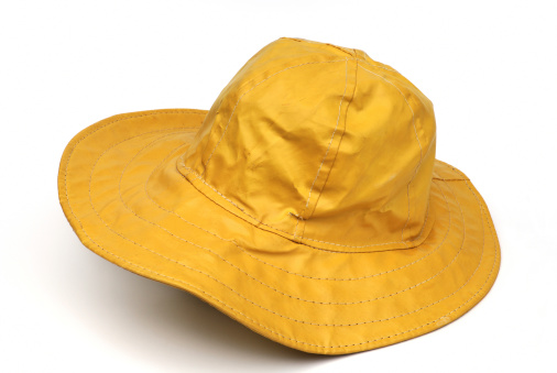 Yellow Vinyl Rain Hat Stock Photo - Download Image Now - Rain Hat, Hat ...
