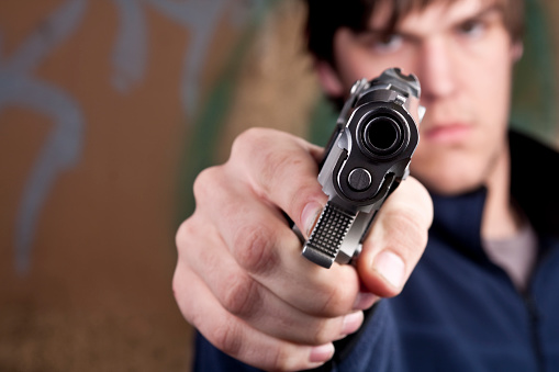 Teen with handgun