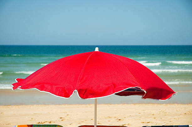 red parasol stock photo