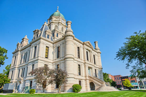 istock Gorgeous summer day with castle like courthouse on green lawn 1746715969