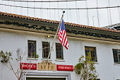 Hanging American Flag outside San Francisco Fire Department upper window view