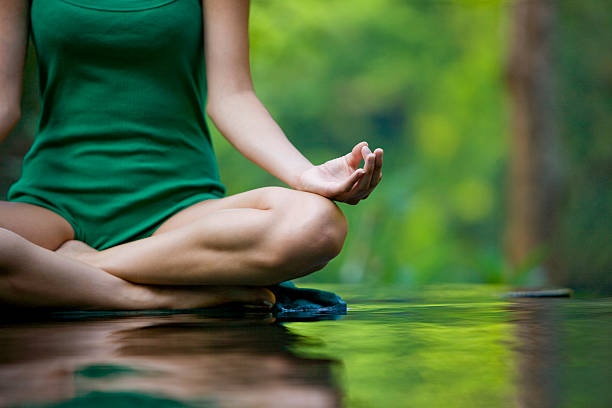 istock Woman doing yoga 174671855