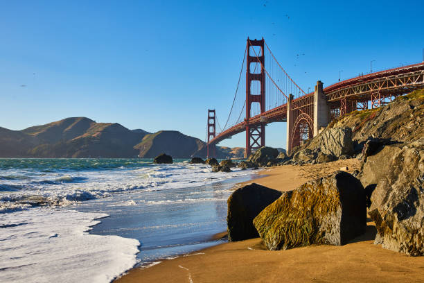 istock Receding waves from San Francisco Marshalls Beach with Golden Gate Bridge 1746735022