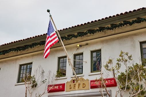 Image of San Francisco Fire Department with hanging American Flag