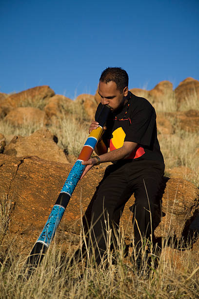 Aboriginal Man playing the Didgeridoo stock photo