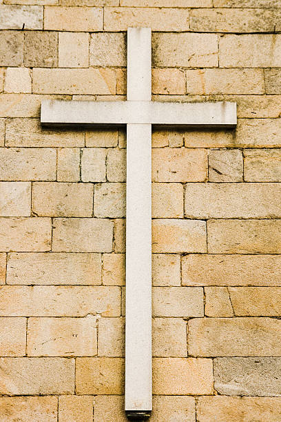 istock Christian cross on the wall 174674297