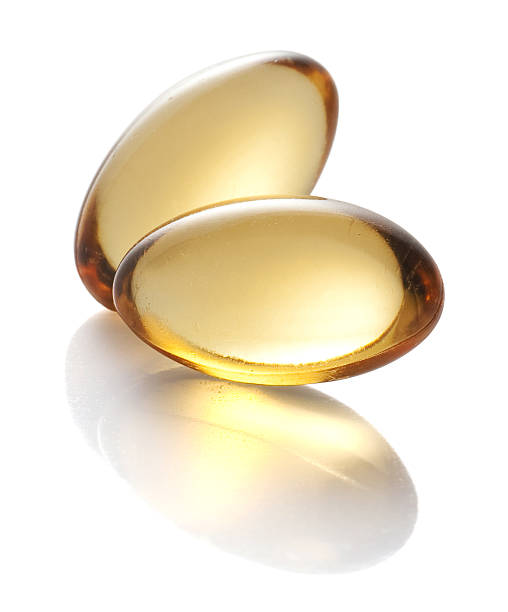гель капсулы витамин e - anti aging pill capsule vitamin pill стоковые фото и изображения