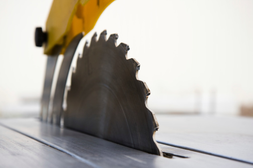 Circular Saw on white background. Shallow depth-of-field.