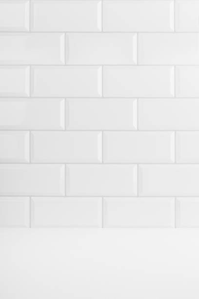 istock Elegant white abstract stage with white glossy ceramic rectangle tile wall, mockup abstract interior of bathroom, kitchen or scene for presentation, show, design in classic mediterranean style. 1746749729
